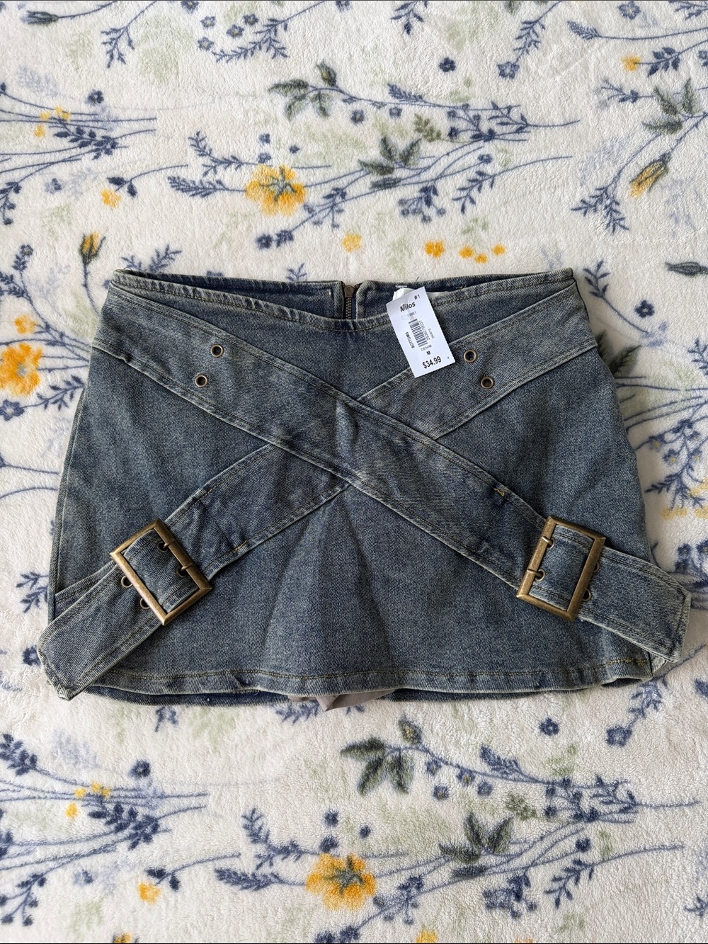 Washed Denim Mini Skirt with Crisscross Buckle Straps and Built-in Shorts